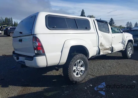 2015 Toyota Tacoma Base V6 z USA, uszkodzony, nr VIN 3TMMU4FN4FM077170